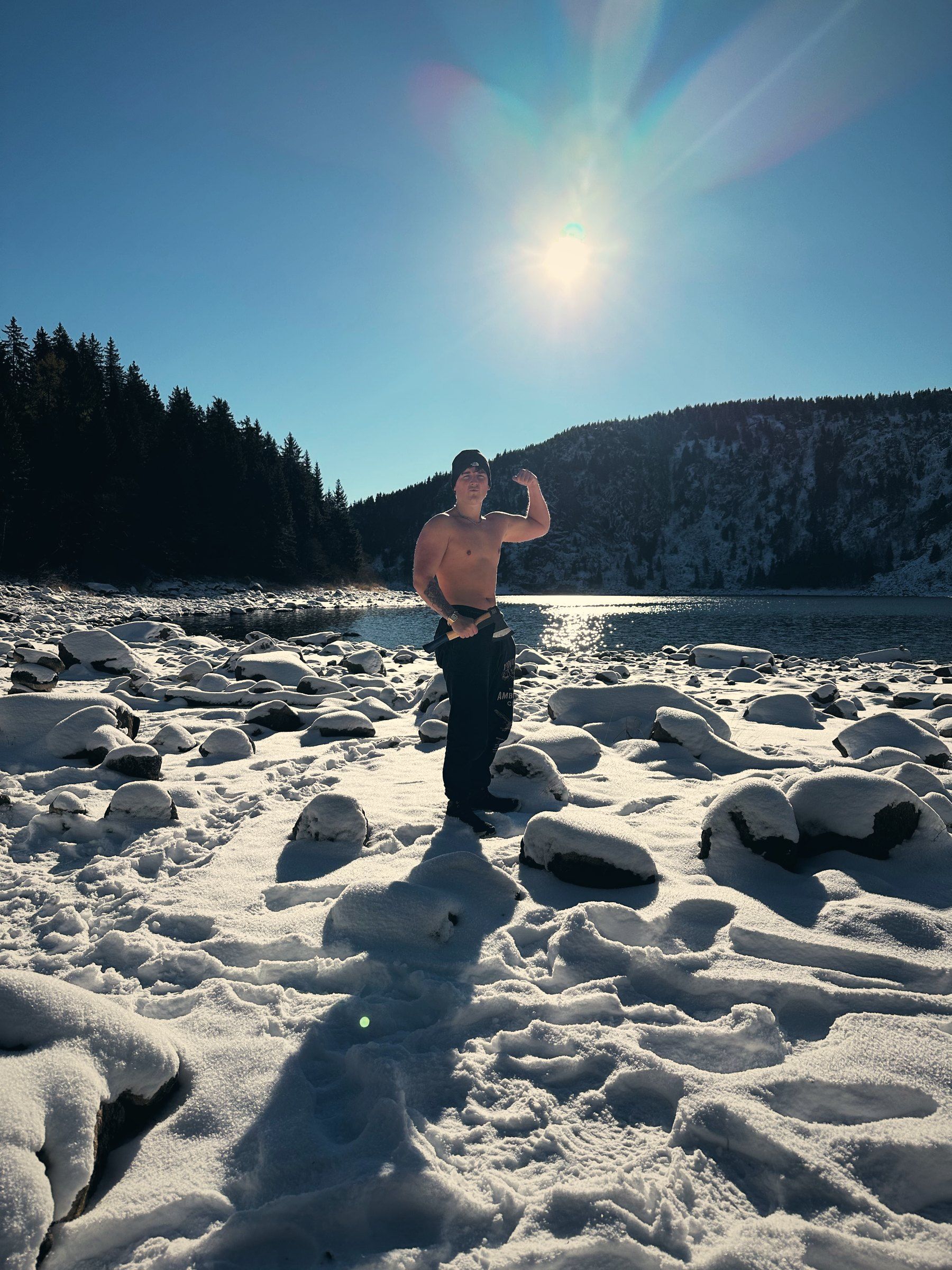 Tea in the snow on the shore of Lac Blanc in the winter sun