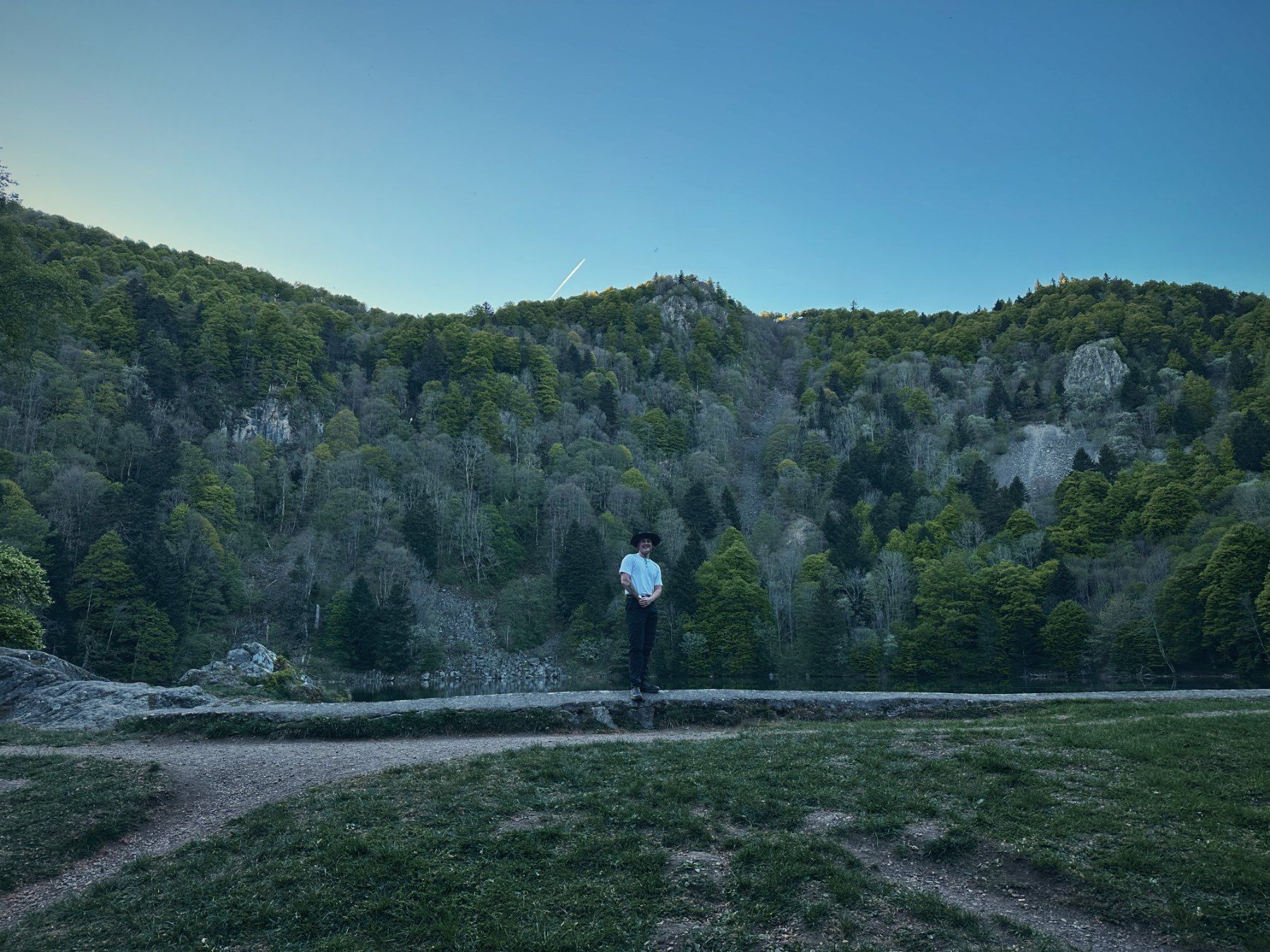 Lac des Perches below a rock wall